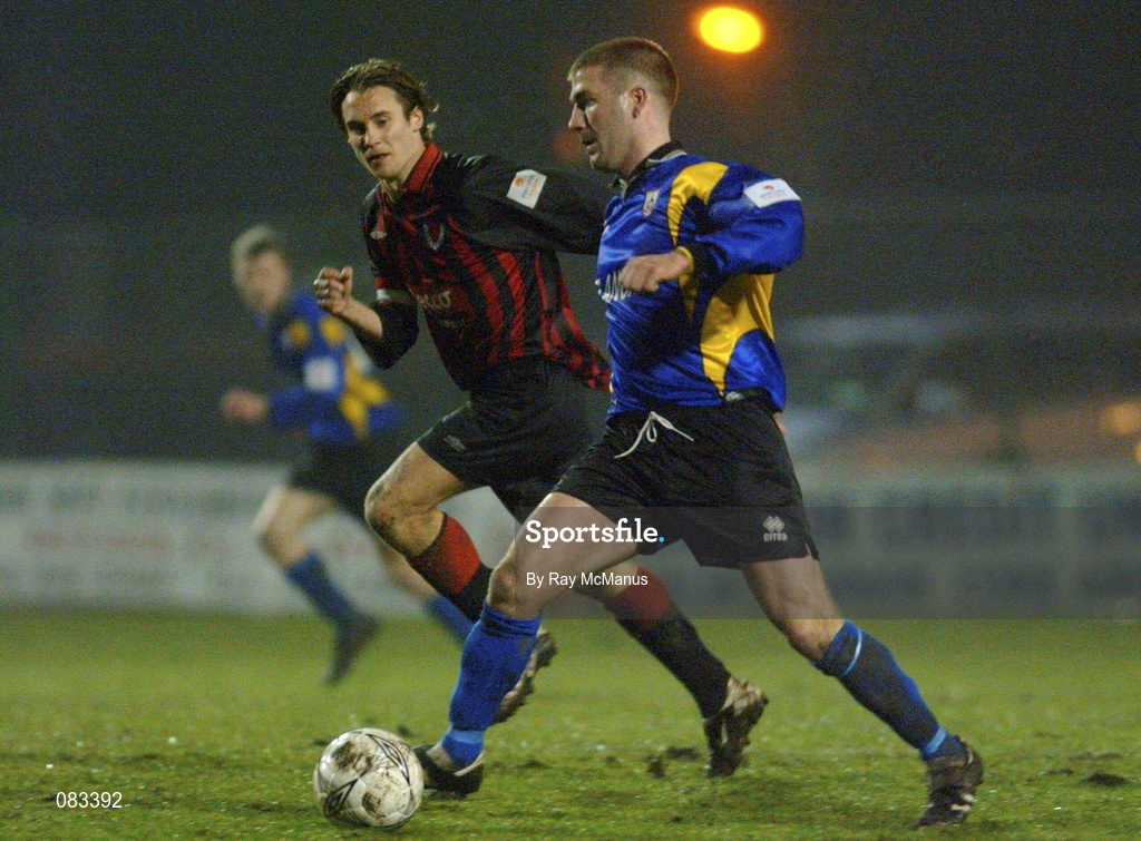 15 March 2002;  Kevin Hunt of Bohemians in action against Alan Reynolds of Longford Town during the Eircom League Premier Division match between Bohemians and Longford Town at Dalymount Park in Dublin. Photo by Ray McManus/Sportsfile