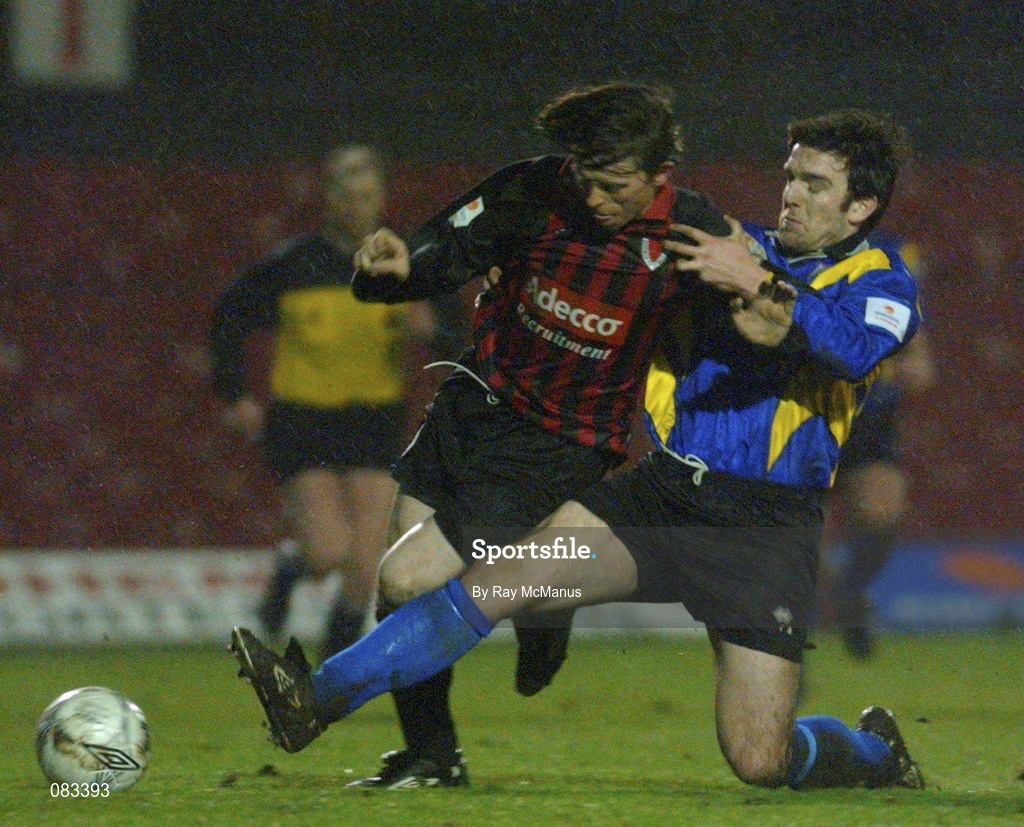 15 March 2002; Bobby Ryan of Bohemians is tackled by Stuart Byrne of Longford Town during the Eircom League Premier Division match between Bohemians and Longford Town at Dalymount Park in Dublin. Photo by Ray McManus/Sportsfile