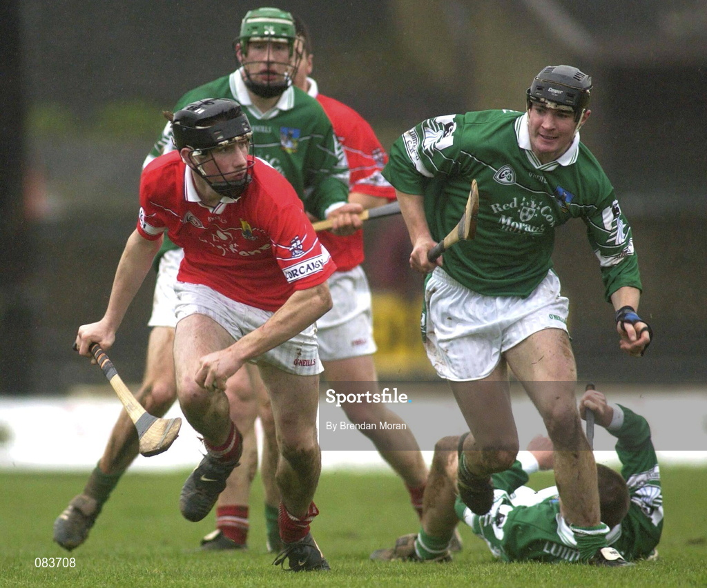 25 February 2002; Kieran Murphy of Cork in action against Stephen Lucey of Limerick during the Allianz National Hurling League Division 1B Round 1 match between Limerick and Cork at the Gaelic Grounds in Limerick. Photo by Brendan Moran/Sportsfile