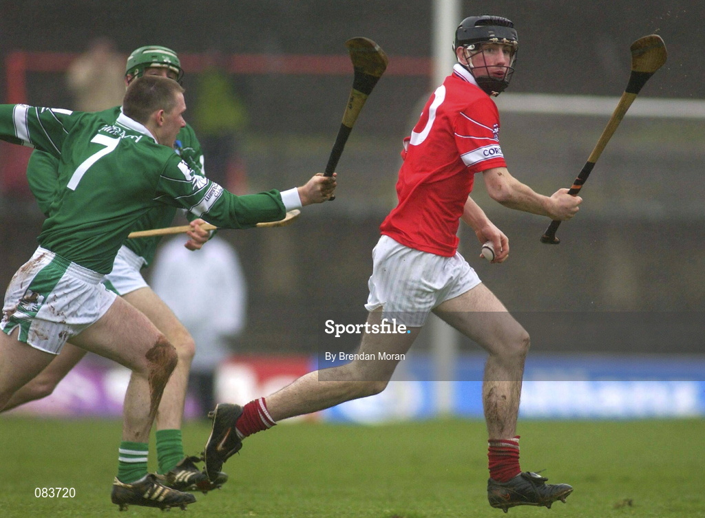25 February 2002; Kieran Murphy of Cork in action against Mark Foley of Limerick during the Allianz National Hurling League Division 1B Round 1 match between Limerick and Cork at the Gaelic Grounds in Limerick. Photo by Brendan Moran/Sportsfile