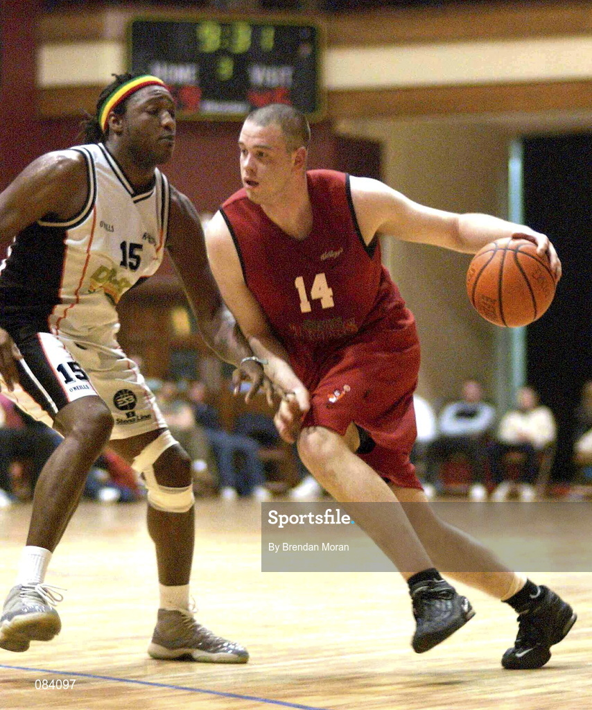 24 March 2002; Michael Quirke of Tralee in action against Chris Davis of Killester during the ESB Men's National Championships Final between Frosties Tigers Tralee and Dart Killester at the National Exhibition Centre in Killarney, Kerry. Photo by Brendan Moran/Sportsfile