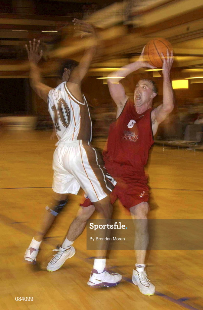 24 March 2002; John Teahan of Tralee in action against Jerome Westbrooks of Killester during the ESB Men's National Championships Final between Frosties Tigers Tralee and Dart Killester at the National Exhibition Centre in Killarney, Kerry. Photo by Brendan Moran/Sportsfile