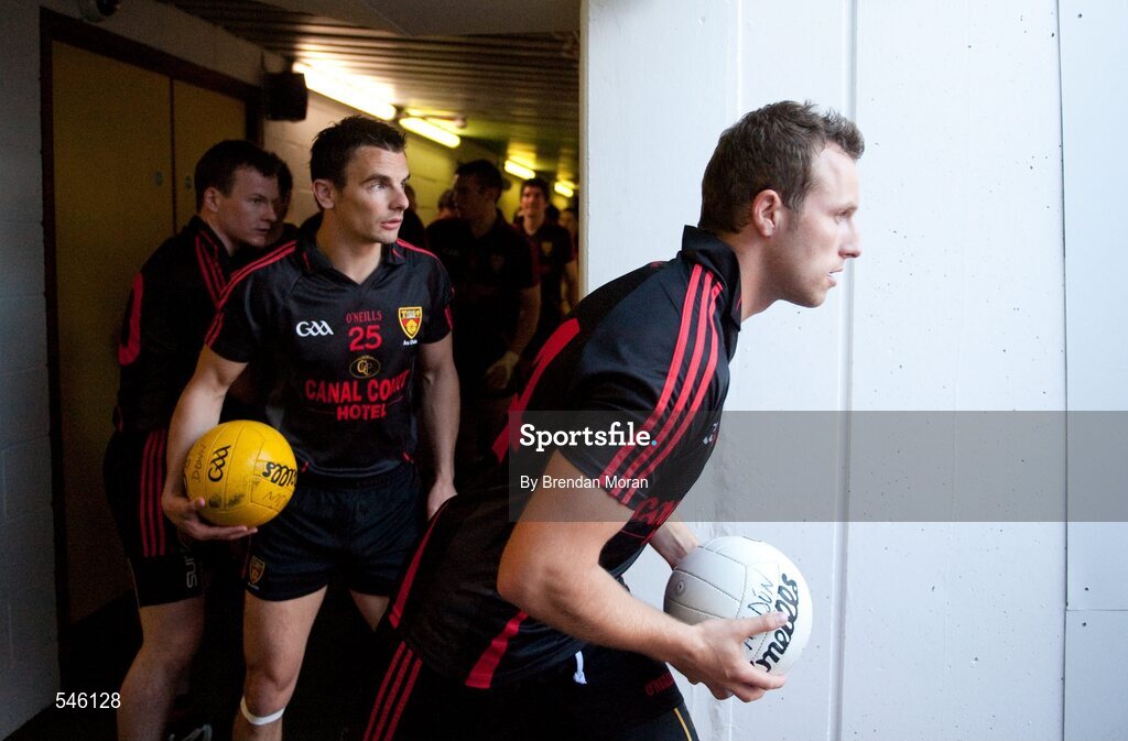 23 July 2011; Ambrose Rogers, right and Daniel Hughes, Down, lead their side out before the game. GAA Football All-Ireland Senior Championship Qualifier Round 4, Cork v Down, Croke Park, Dublin. Picture credit: Brendan Moran / SPORTSFILE