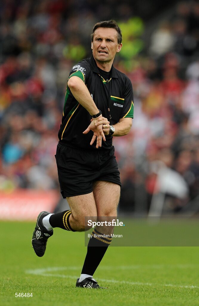 17 July 2011; Referee Maurice Deegan indicates a free for holding. Ulster GAA Football Senior Championship Final, Derry v Donegal, St Tiernach's Park, Clones, Co. Monaghan. Picture credit: Brendan Moran / SPORTSFILE