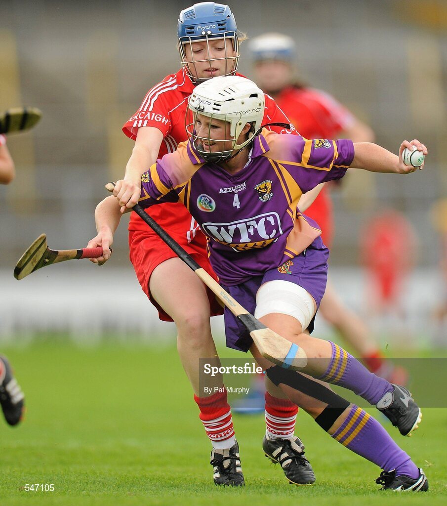 13 August 2011; Karen Atkinson, Wexford, in action against Joanne Casey, Cork. All-Ireland Senior Camogie Championship Semi-Final in association with RTE Sport, Cork v Wexford, Nowlan Park, Kilkenny. Picture credit: Pat Murphy / SPORTSFILE