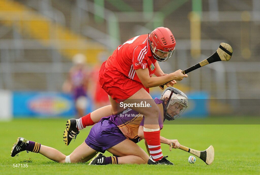 13 August 2011; Kate Kelly, Wexford, in action against Anna Geary, Cork. All-Ireland Senior Camogie Championship Semi-Final in association with RTE Sport, Cork v Wexford, Nowlan Park, Kilkenny. Picture credit: Pat Murphy / SPORTSFILE