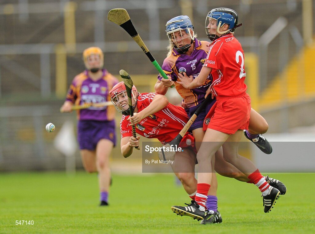 13 August 2011; Katrina Parrock, Wexford, in action against Anna Geary, left, Jenny Duffy, right, Cork. All-Ireland Senior Camogie Championship Semi-Final in association with RTE Sport, Cork v Wexford, Nowlan Park, Kilkenny. Picture credit: Pat Murphy / SPORTSFILE