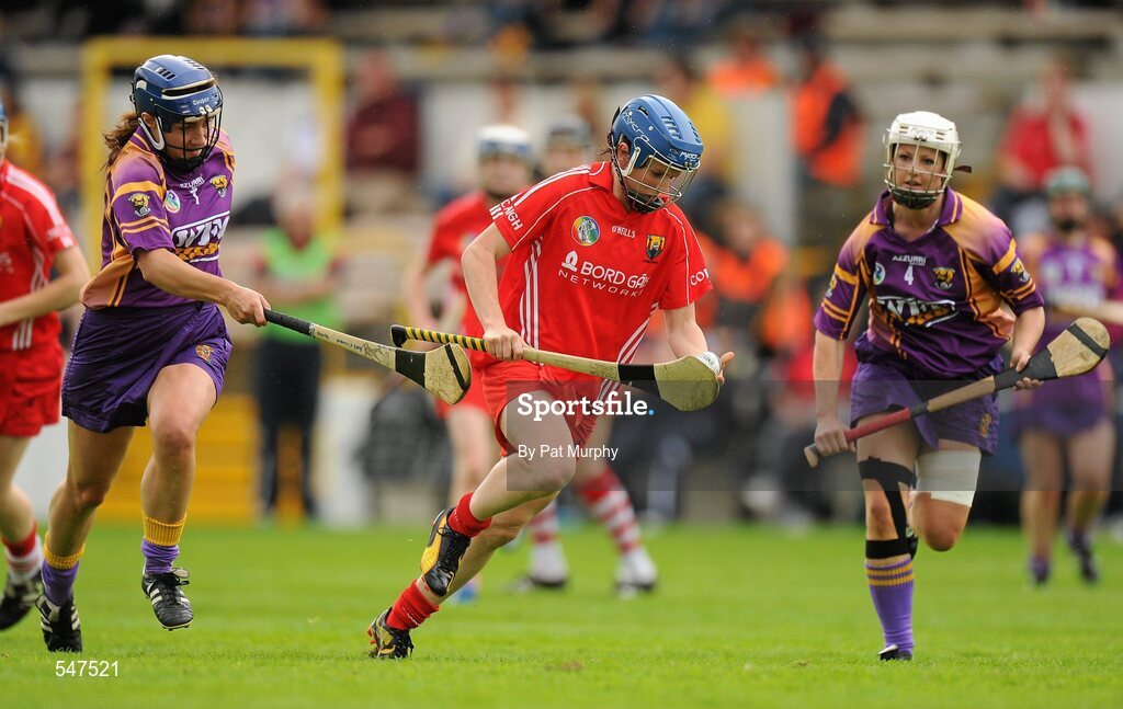 13 August 2011; Briege Corkery, Cork, in action against Aoife O'Connor, left, and Karen Atkinson, right, Wexford. All-Ireland Senior Camogie Championship Semi-Final in association with RTE Sport, Cork v Wexford, Nowlan Park, Kilkenny. Picture credit: Pat Murphy / SPORTSFILE