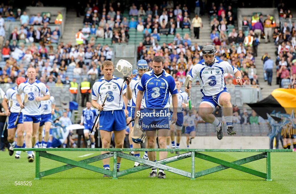 7 August 2011; The Waterford players make their way to the bench for the traditional team photograph. GAA Hurling All-Ireland Senior Championship Semi-Final, Kilkenny v Waterford, Croke Park, Dublin. Picture credit: Ray McManus / SPORTSFILE