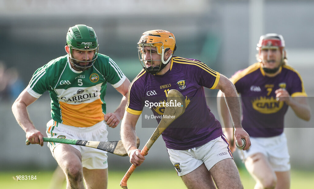 12 March 2017; David Redmond of Wexford in action against Derek Morkan of Offaly during the Allianz Hurling League Division 1B Round 4 match between Offaly and Wexford at O’Connor Park in Tullamore, Co. Offaly. Photo by David Maher/Sportsfile