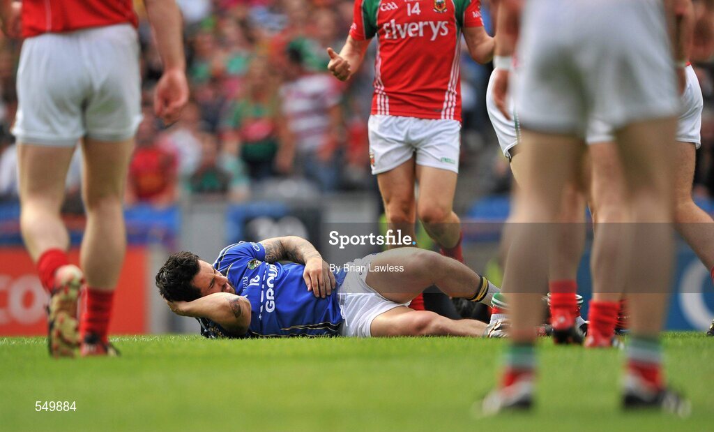 21 August 2011; Kerry's Paul Galvin lies injured having only come on the pitch as a substitute. GAA Football All-Ireland Senior Championship Semi-Final, Mayo v Kerry, Croke Park, Dublin. Picture credit: Brian Lawless / SPORTSFILE