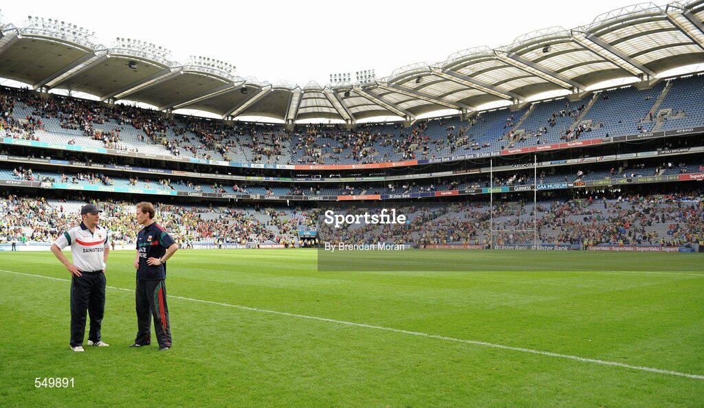 21 August 2011; Mayo manager James Horan in conversation with his assistant James Nallen after the game with the final score reading Kerry 1-20 Mayo 1-11 on the scoreboard. GAA Football All-Ireland Senior Championship Semi-Final, Mayo v Kerry, Croke Park, Dublin. Picture credit: Brendan Moran / SPORTSFILE
