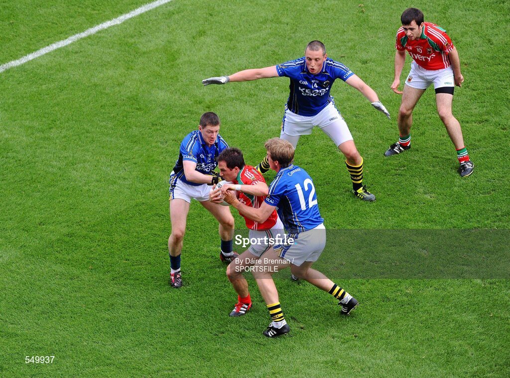 21 August 2011; Mayo captain Alan Dillon is surrounded by Kerry forwards, left to right, Kieran O'Leary, Donnchadh Walsh, and Kieran Donaghy. GAA Football All-Ireland Senior Championship Semi-Final, Mayo v Kerry, Croke Park, Dublin. Picture credit: Dáire Brennan / SPORTSFILE