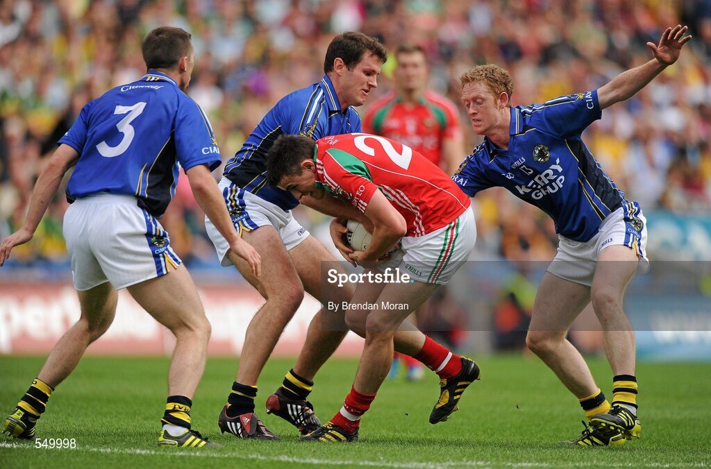 21 August 2011; Jason Doherty, Mayo, in action against Marc O Sé, left, Eoin Brosnan and Colm Cooper, Kerry. GAA Football All-Ireland Senior Championship Semi-Final, Mayo v Kerry, Croke Park, Dublin. Picture credit: Brendan Moran / SPORTSFILE