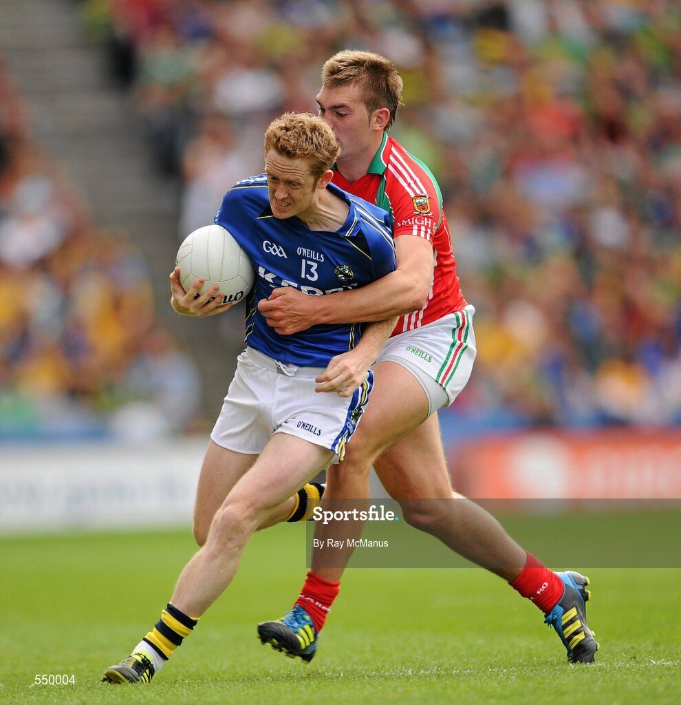 21 August 2011; Colm Cooper, Kerry, is tackled by Aidan O'Shea, Mayo. GAA Football All-Ireland Senior Championship Semi-Final, Mayo v Kerry, Croke Park, Dublin. Picture credit: Ray McManus / SPORTSFILE