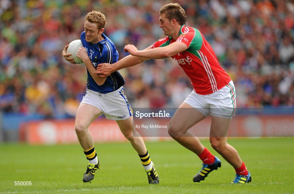 21 August 2011; Colm Cooper, Kerry, is tackled by Aidan O'Shea, Mayo. GAA Football All-Ireland Senior Championship Semi-Final, Mayo v Kerry, Croke Park, Dublin. Picture credit: Ray McManus / SPORTSFILE