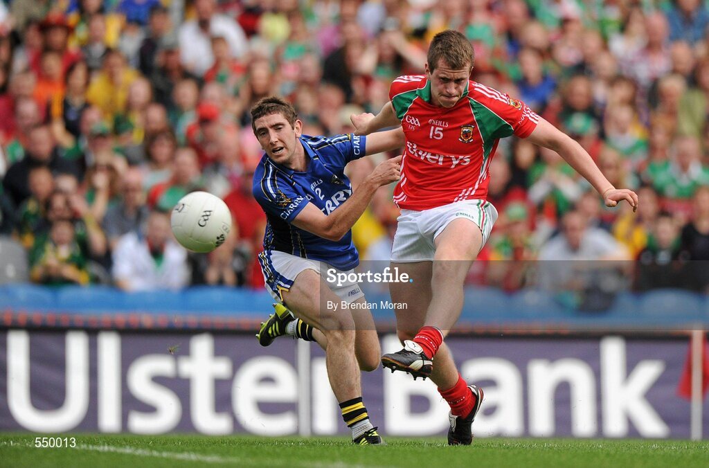 21 August 2011; Cillian O'Connor, Mayo, scores his side's goal despite the best efforts of Killian Young, Kerry. GAA Football All-Ireland Senior Championship Semi-Final, Mayo v Kerry, Croke Park, Dublin. Picture credit: Brendan Moran / SPORTSFILE