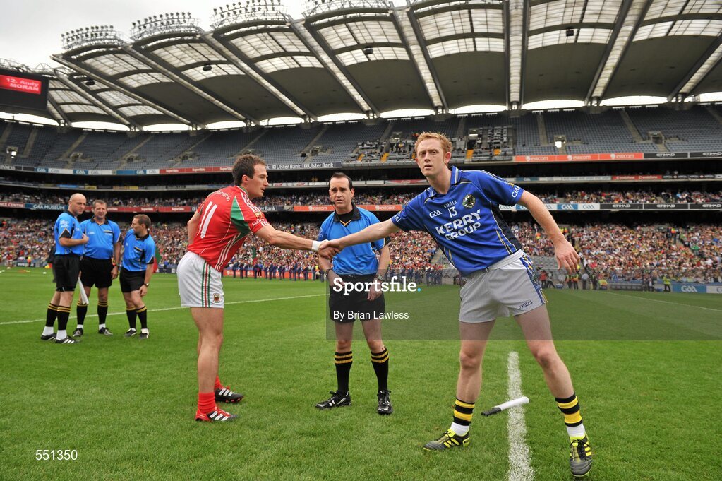 21 August 2011; Mayo captain Alan Dillon, left, shakes hands with Kerry captain Colm Cooper in the company of referee David Coldrick after the coin toss. GAA Football All-Ireland Senior Championship Semi-Final, Mayo v Kerry, Croke Park, Dublin. Picture credit: Brian Lawless / SPORTSFILE