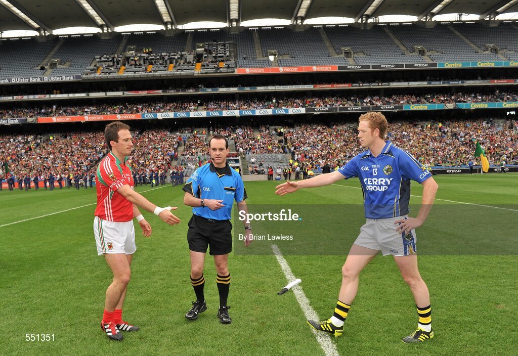 21 August 2011; Mayo captain Alan Dillon, left, goes to shake hands with Kerry captain Colm Cooper in the company of referee David Coldrick after the coin toss. GAA Football All-Ireland Senior Championship Semi-Final, Mayo v Kerry, Croke Park, Dublin. Picture credit: Brian Lawless / SPORTSFILE