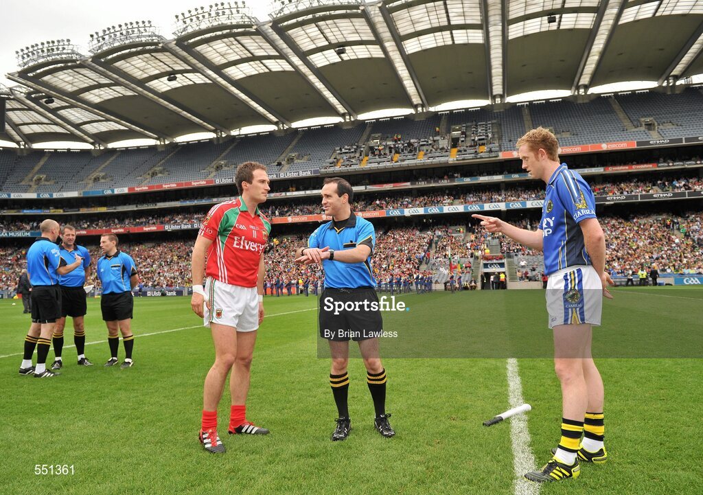 21 August 2011; Mayo captain Alan Dillon and Kerry captain Colm Cooper in the company of referee David Coldrick for the coin toss. GAA Football All-Ireland Senior Championship Semi-Final, Mayo v Kerry, Croke Park, Dublin. Picture credit: Brian Lawless / SPORTSFILE