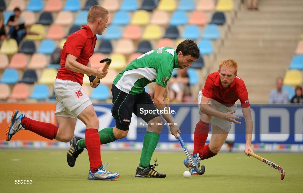 26 August 2011; Christopher Cargo, Ireland, in action against Semen Matkovskiy, left, and Sergey Kostarev, Russia. Ireland v Russia - GANT EuroHockey Nations Men's Championships 2011. Warsteiner HockeyPark, Mönchengladbach, Germany. Picture credit: Diarmuid Greene / SPORTSFILE