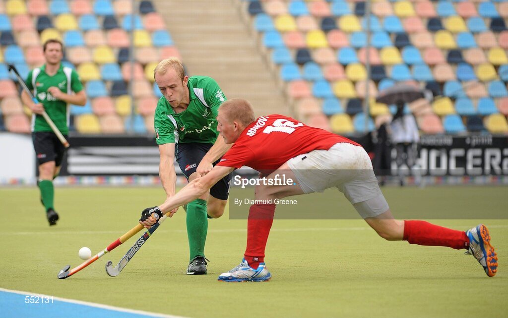 26 August 2011; Eugene Magee, Ireland, in action against Semen Matkovskiy, Russia. Ireland v Russia - GANT EuroHockey Nations Men's Championships 2011. Warsteiner HockeyPark, Mönchengladbach, Germany. Picture credit: Diarmuid Greene / SPORTSFILE