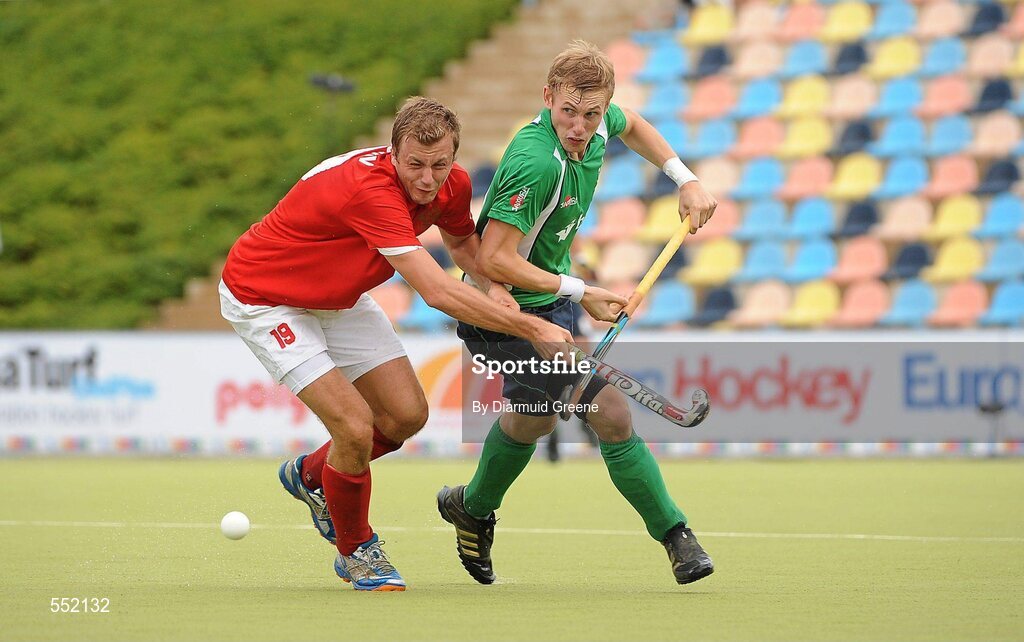 26 August 2011; David Ames, Ireland, in action against Iaroslav Loginov, Russia. Ireland v Russia - GANT EuroHockey Nations Men's Championships 2011. Warsteiner HockeyPark, Mönchengladbach, Germany. Picture credit: Diarmuid Greene / SPORTSFILE