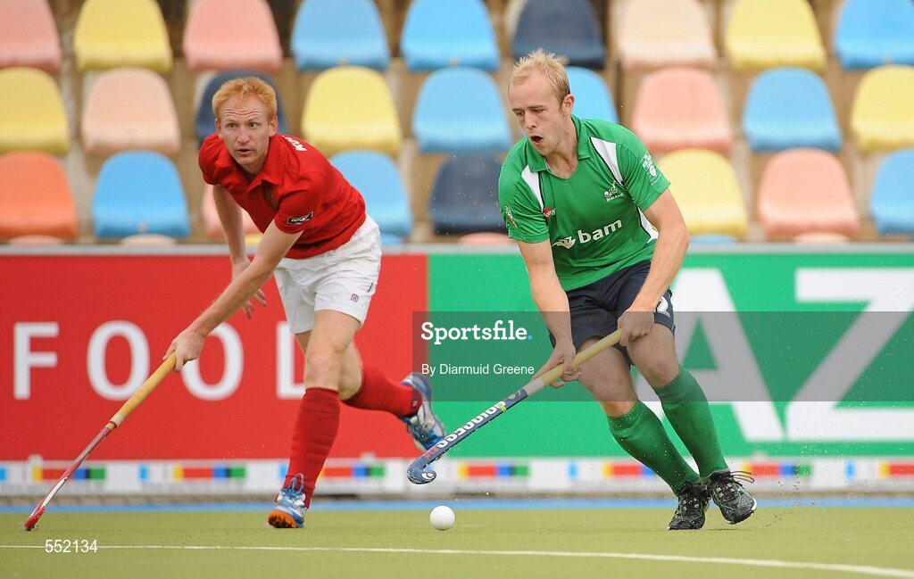 26 August 2011; Eugene Magee, Ireland, in action against Sergey Kostarev, Russia. Ireland v Russia - GANT EuroHockey Nations Men's Championships 2011. Warsteiner HockeyPark, Mönchengladbach, Germany. Picture credit: Diarmuid Greene / SPORTSFILE
