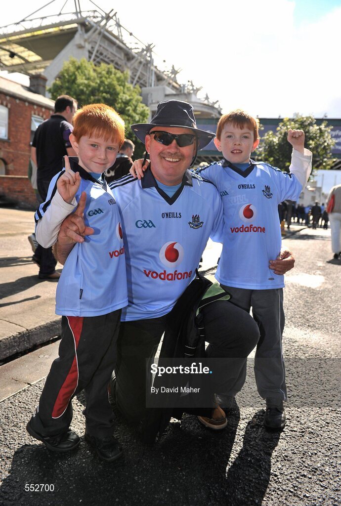 28 August 2011; Dublin supporters, Jim Griepsmy, from Ontario, Canada, with brothers Cian, right, age 8, and Conor Sweeney, age 6, from Dublin. Supporters at the GAA Football All-Ireland Championship Semi-Finals, Croke Park, Dublin. Picture credit: David Maher / SPORTSFILE