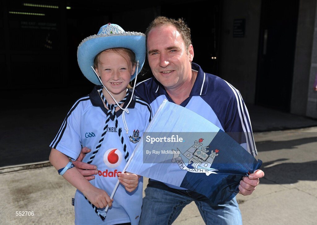 28 August 2011; Dublin supporters Louise Hopkins, age 7, and her father Philip, from Ringsend, Dublin, on their way to the GAA Football All-Ireland Championship Semi-Finals, Croke Park, Dublin. Picture credit: Ray McManus / SPORTSFILE
