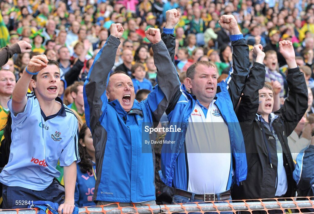 28 August 2011; Dublin supporters cheer on their side during the closing stages of the game. Supporters at the GAA Football All-Ireland Championship Semi-Finals, Croke Park, Dublin. Picture credit: David Maher / SPORTSFILE