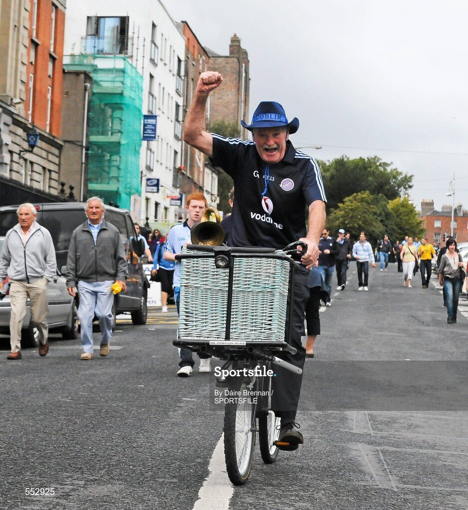 28 August 2011; Dublin supporter Martin Bennet, from Crumlin, comes down Fitzgibbon street on his bike. Supporters at the GAA Football All-Ireland Championship Semi-Finals, Croke Park, Dublin. Picture credit: Dáire Brennan / SPORTSFILE
