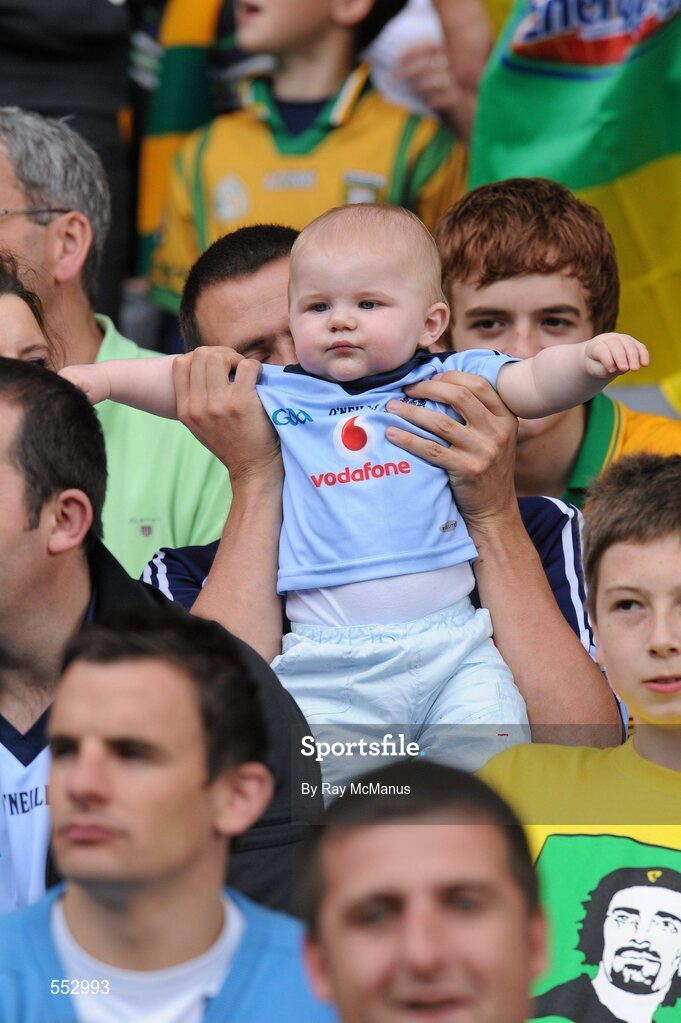 28 August 2011; A young Dublin supporter watches the game from the Hogan Stand. GAA Football All-Ireland Championship Semi-Finals, Croke Park, Dublin. Picture credit: Ray McManus / SPORTSFILE