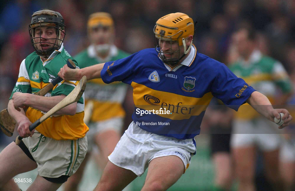 30 March 2002; Liam Cahill of Tipperary in action against John Paul O'Meara of Offaly during the Allianz National Hurling League Division 1B Round 1 match between Offaly and Tipperary in St Brendan's Park in Birr, Offaly. Photo by Brendan Moran/Sportsfile