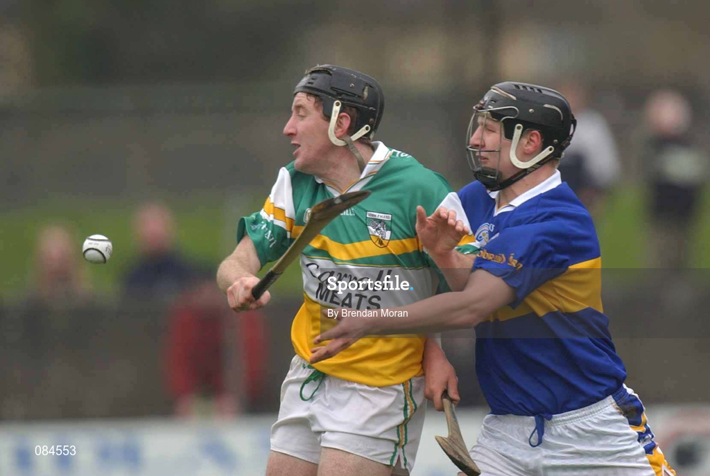 30 March 2002; Brian Whelahan of Offaly in action against Philip Maher of Tipperary during the Allianz National Hurling League Division 1B Round 1 match between Offaly and Tipperary in St Brendan's Park in Birr, Offaly. Photo by Brendan Moran/Sportsfile