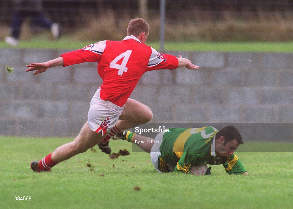 31 March 2002; Ian Twiss of Kerry is tackled by David Brennan of Louth during the Allianz National Football League Division 2A Round 7 match between Louth and Kerry at Páirc Mhuire in Ardee in Louth. Photo by Aoife Rice/Sportsfile