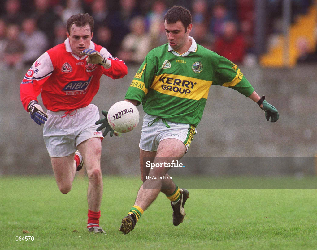 31 March 2002; Ian Twiss of Kerry in action against Simon Gerard of Louth during the Allianz National Football League Division 2A Round 7 match between Louth and Kerry at Páirc Mhuire in Ardee in Louth. Photo by Aoife Rice/Sportsfile