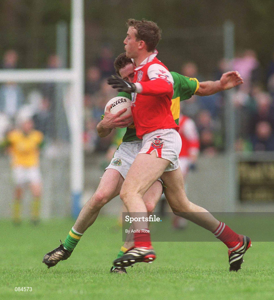 31 March 2002; John Sheehan of Kerry in action against Nicky McDonnell of Louth during the Allianz National Football League Division 2A Round 7 match between Louth and Kerry at Páirc Mhuire in Ardee in Louth. Photo by Aoife Rice/Sportsfile