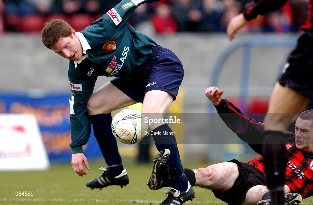 31 March 2002; Robbie Griffin of St Patrick's Athletic in action against Paul McNally of Longford Town during the eircom League Premier Division match between Longford Town and St Patrtick's Athletic at Flancare Park in Longford. Photo by David Maher/Sportsfile