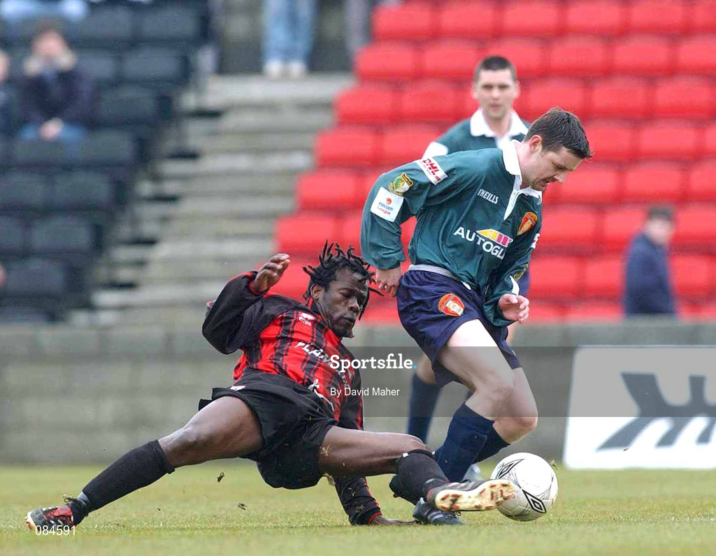 31 March 2002; Willie Burke of St Patrick's Athletic in action against Eric Levine of Longford Town during the eircom League Premier Division match between Longford Town and St Patrtick's Athletic at Flancare Park in Longford. Photo by David Maher/Sportsfile
