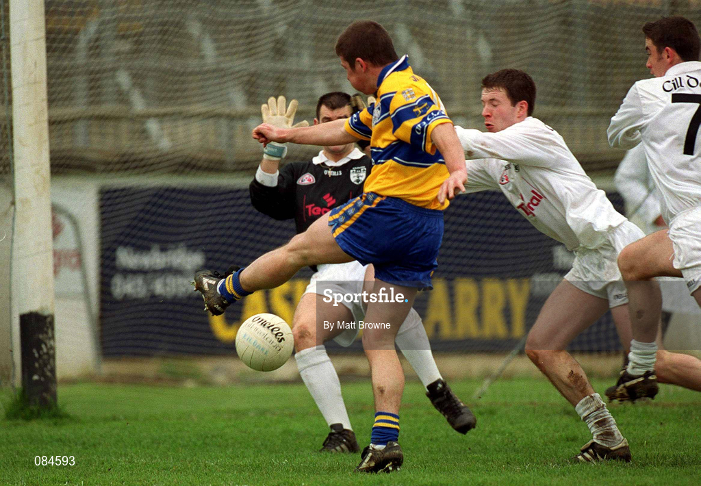 31 March 2002; Daniel Ryan of Clare scores his side's second goal past Kildare goalkeeper Christy Byrne during the Allianz National Football League Division 1B Round 7 match between Kildare and Clare at St Conleth's Park in Newbridge, Kildare. Photo by Matt Browne/Sportsfile