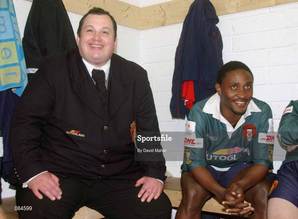 31 March 2002; St Patrick's Athletic manager Pat Dolan and Charles Mbabazi Livingstone celebrate in their dressing room after the eircom League Premier Division match between Longford Town and St Patrtick's Athletic at Flancare Park in Longford. St Patrick's Athletic were top of the table after the last game of the season, only to later finish in third due to a 15 point deduction as Charles Mbabazi Livingstone was deemed to have played in five games while unregistered. Photo by David Maher/Sportsfile
