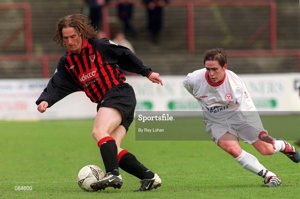 31 March 2002; Simon Webb of Bohemians in action against Richie Baker of Shelbourne during the eircom League Premier Division match between Bohemians and Shelbourne at Dalymount Park in Dublin. Photo by Ray Lohan/Sportsfile