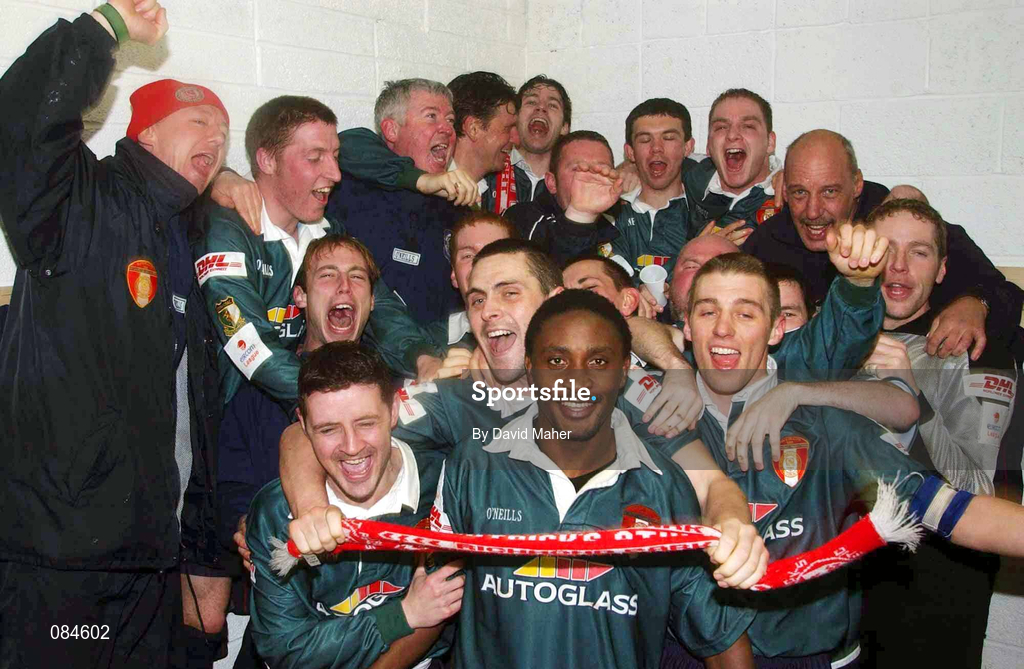 31 March 2002; St Patrick's Athletic players and officials celebrate in their dressing room after the eircom League Premier Division match between Longford Town and St Patrtick's Athletic at Flancare Park in Longford. St Patrick's Athletic were top of the table after the last game of the season, only to later finish in third due to a 15 point deduction as Charles Mbabazi Livingstone was deemed to have played in five games while unregistered. Photo by David Maher/Sportsfile