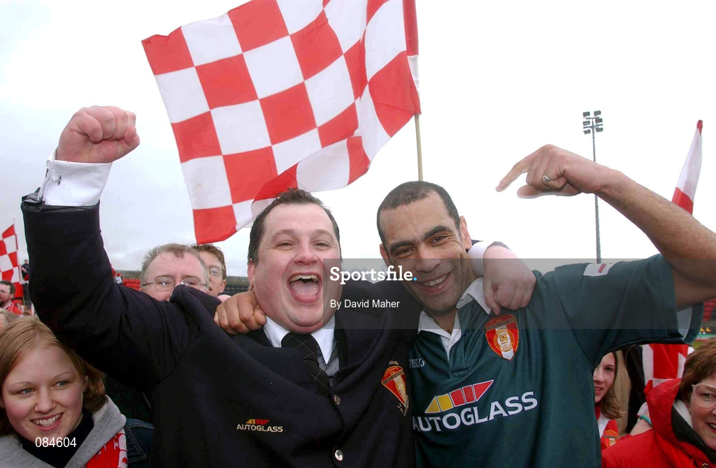 31 March 2002; St Patrick's Athletic manager Pat Dolan celebrates with Paul Osam on the pitch after the eircom League Premier Division match between Longford Town and St Patrtick's Athletic at Flancare Park in Longford. St Patrick's Athletic were top of the table after the last game of the season, only to later finish in third due to a 15 point deduction as Charles Mbabazi Livingstone was deemed to have played in five games while unregistered. Photo by David Maher/Sportsfile