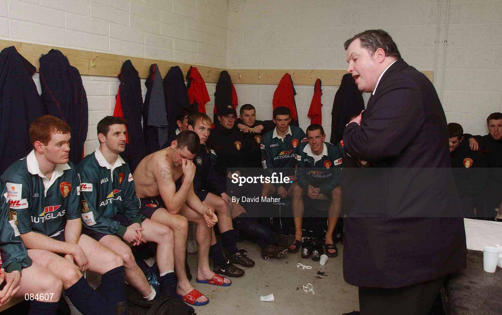 31 March 2002; St Patrick's Athletic manager Pat Dolan talks to his players and officials in their dressing room after the eircom League Premier Division match between Longford Town and St Patrtick's Athletic at Flancare Park in Longford. St Patrick's Athletic were top of the table after the last game of the season, only to later finish in third due to a 15 point deduction as Charles Mbabazi Livingstone was deemed to have played in five games while unregistered. Photo by David Maher/Sportsfile