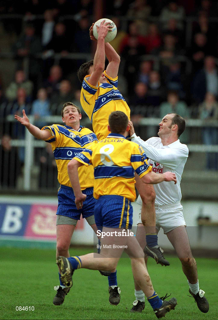 31 March 2002; Peter O'Dwyer of Clare takes the ball in the air from Killian Brennan of Kildare during the Allianz National Football League Division 1B Round 7 match between Kildare and Clare at St Conleth's Park in Newbridge, Kildare. Photo by Matt Browne/Sportsfile
