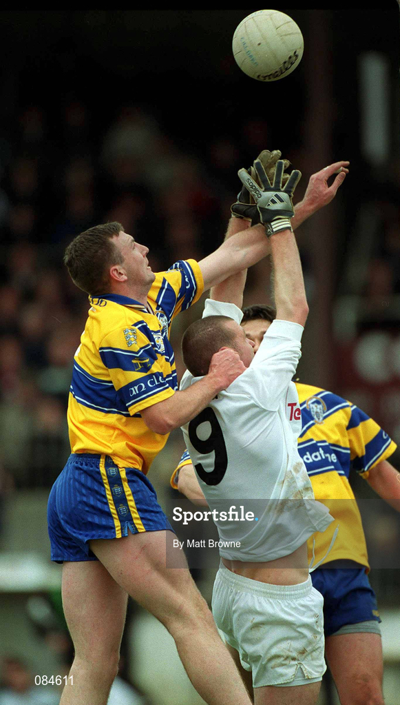 31 March 2002; Brian Considine of Clare in action against Ronan Sweeney of Kildare during the Allianz National Football League Division 1B Round 7 match between Kildare and Clare at St Conleth's Park in Newbridge, Kildare. Photo by Matt Browne/Sportsfile