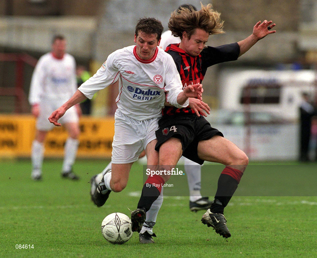 31 March 2002; Jim Crawford of Shelbourne in action against Kevin Hunt of Bohemians during the eircom League Premier Division match between Bohemians and Shelbourne at Dalymount Park in Dublin. Photo by Ray Lohan/Sportsfile