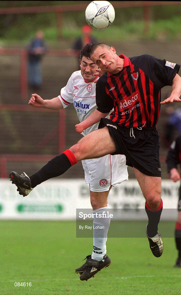 31 March 2002; Peter Hutton of Shelbourne in action against David Morrison of Bohemians during the eircom League Premier Division match between Bohemians and Shelbourne at Dalymount Park in Dublin. Photo by Ray Lohan/Sportsfile